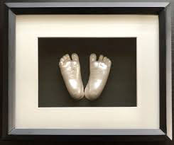 Box Frame used to display Baby feet mouldings